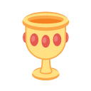 a gold goblet with red jems